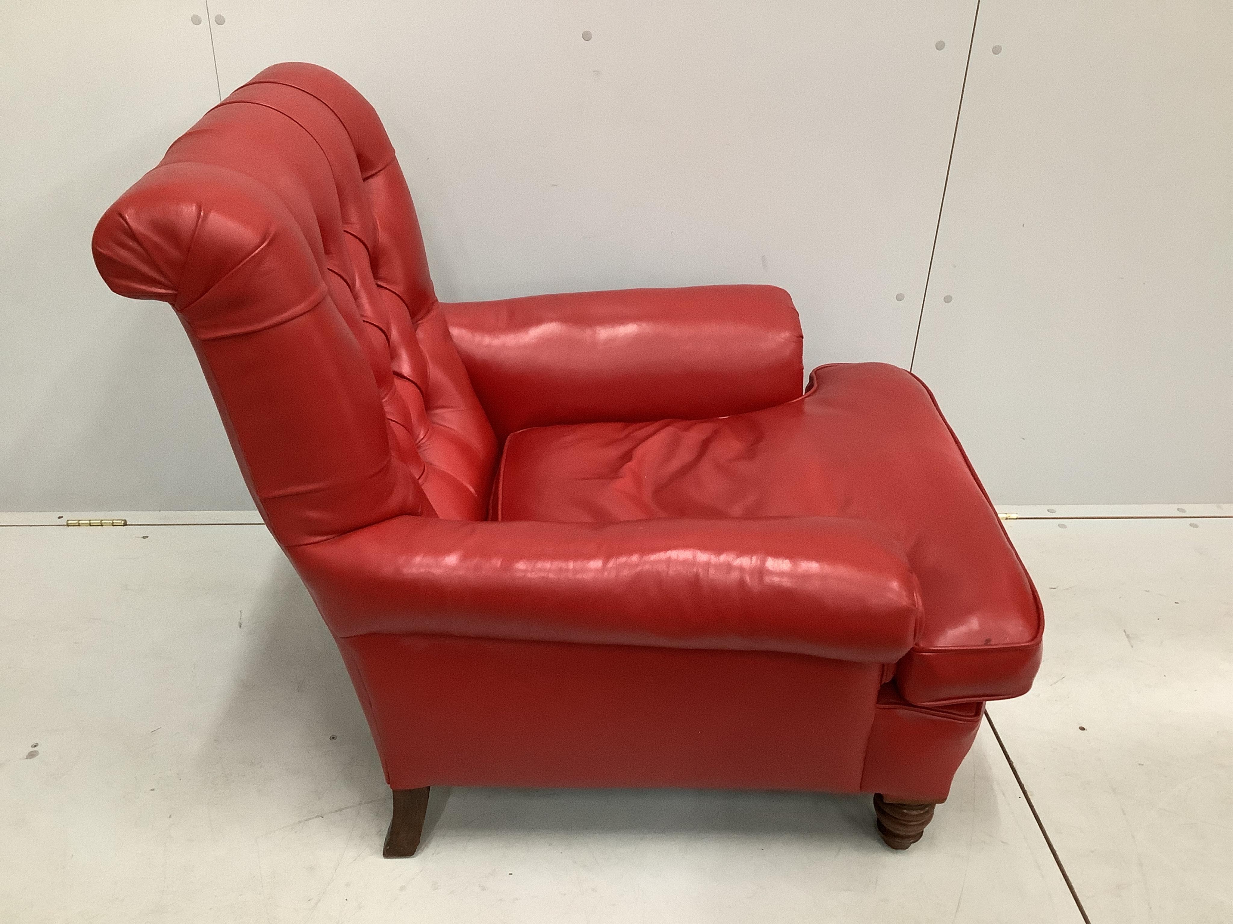 A Victorian deep buttoned red leather armchair, width 90cm, depth 92cm, height 88cm